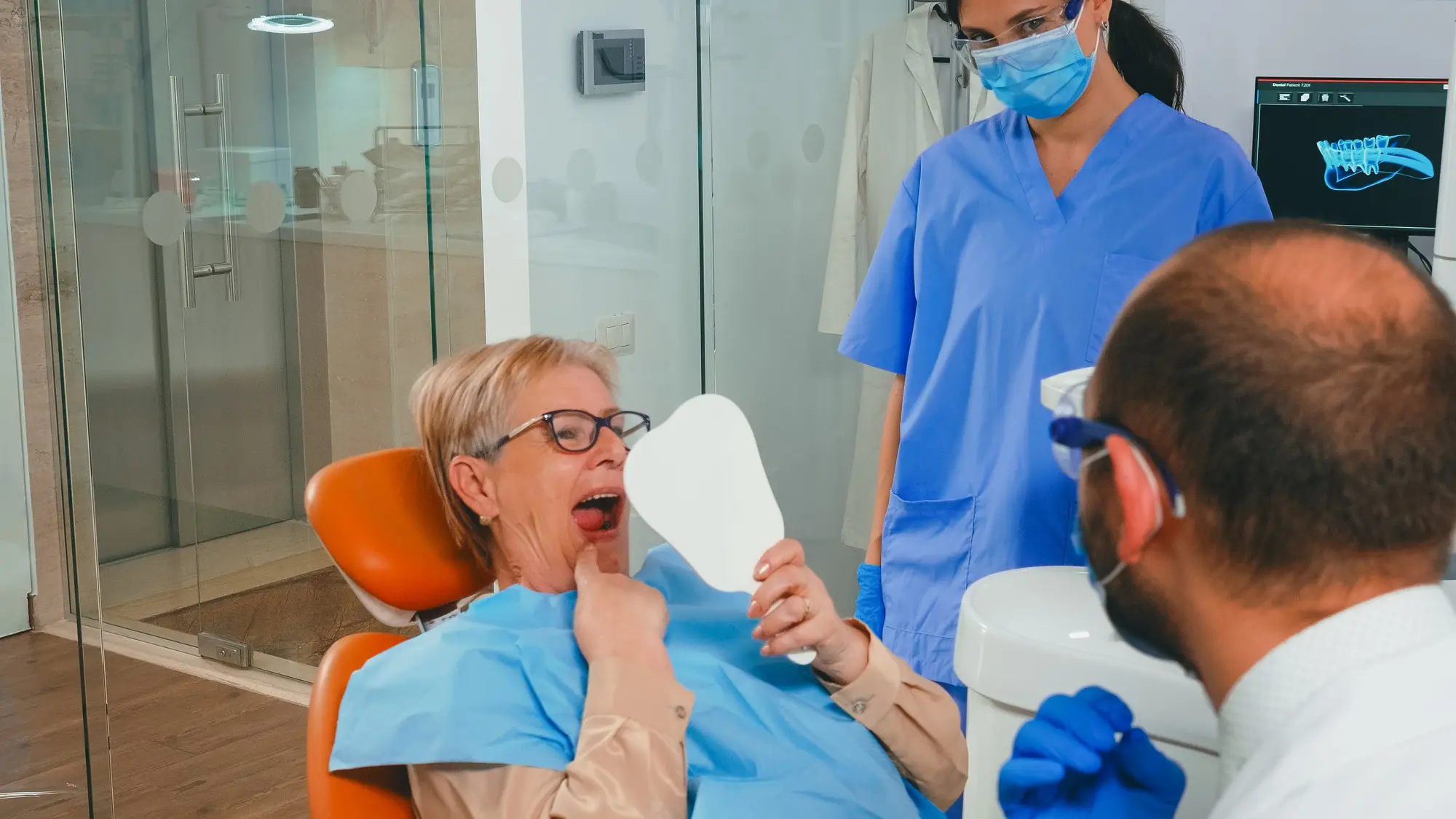 Patient looking at traditional full dentures. Nashville dentures and Implants.